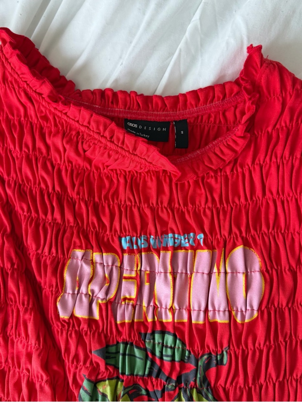 Red Smocked Graphic Sleeveless Top - Picture 7 of 8